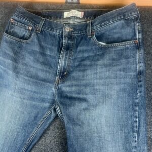 Levi's 557 Jeans Mens 38X29 Blue Denim Cotton Mid Rise Relaxed Fit Boot Cut Leg